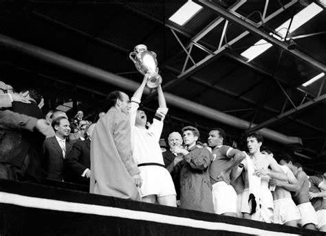 AC Milan captain Cesare Maldini holds up the European Cup trophy after ...