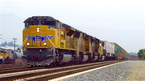 A new Union Pacific SD70ACe & Amtrak Cabbage Double Header - YouTube