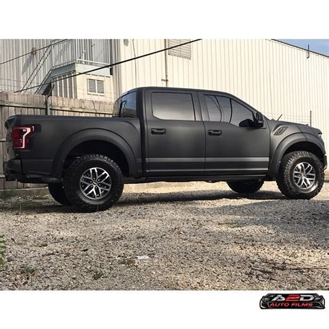 Ford Raptor wrapped in Matte Deep Black vinyl