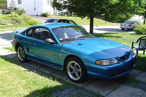 Teal 1995 Ford Mustang