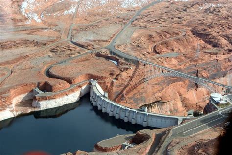 Aerial View of Glen Canyon Dam with Navajo Generating Station in the ...