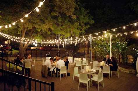 The Outdoor Nighttime Reception with String Lights at Cafe & Bar Lurcat