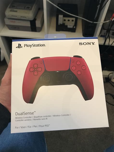 My Cosmic Red PS5 DualSense controller arrived the other day... not ...