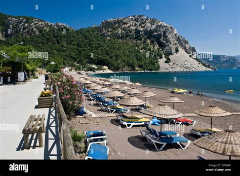 Beach in resort town of Turunc Mugla Turkey Stock Photo - Alamy