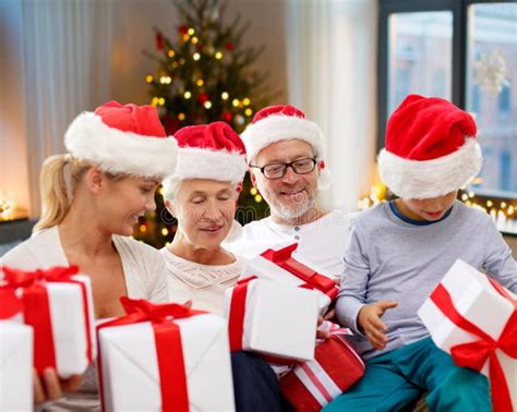 Happy Family with Christmas Gifts at Home Stock Photo - Image of ...