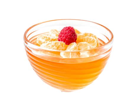 Delicious orange fruit jelly on white with tangerine - Creative Commons Bilder