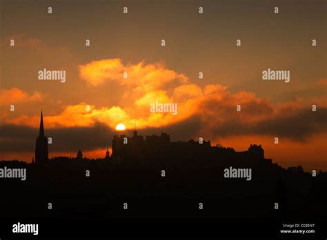 Sunset behind Edinburgh Castle Stock Photo - Alamy