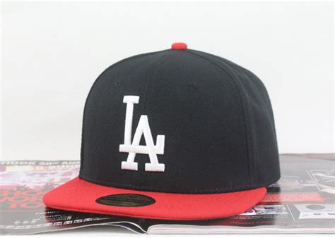 Los Angeles Dodgers Logos Baseball Cap | Los angeles dodgers logo, Caps ...