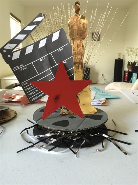 Hollywood centerpiece | Movie themed party, Hollywood theme party ...