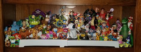 1 shelf of my Disney toys collection. Anyone else here love collecting ...