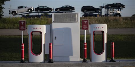 Tesla Looks to Open Its EV-Charging Network - WSJ