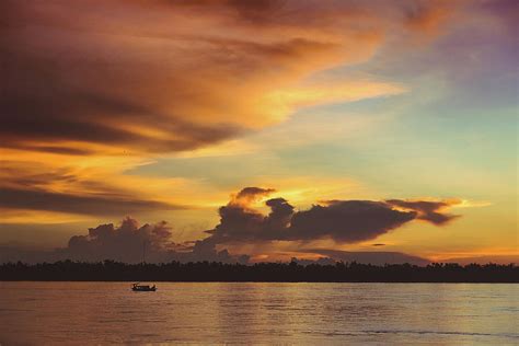 Sunset in the mekong river Photograph by Sergio Florez Alonso - Fine ...