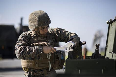 Marine Corps Combat Engineers (MOS 137) carry out construction and ...