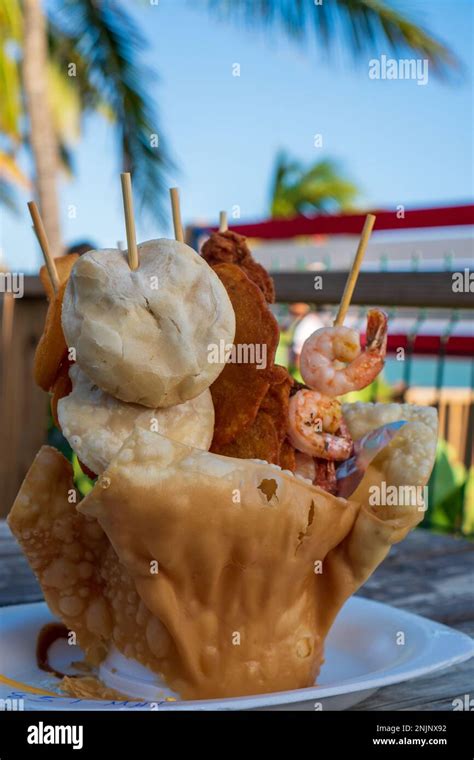 Puerto Rico street food of seafood mix on fry Doug cup Stock Photo - Alamy