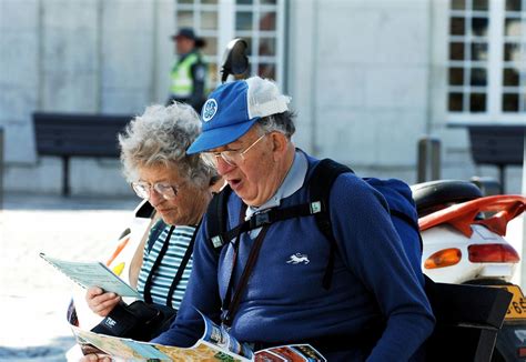 Old tourist couple