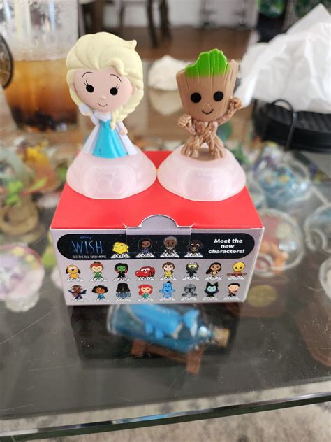 Disney 100 New McDonald’s Toy 2023 Elsa And Groot Collectible Figurines - Parceiros Tecimob