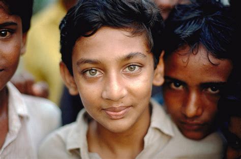 Boy with Green Eyes India Photograph by Wernher Krutein | Pixels