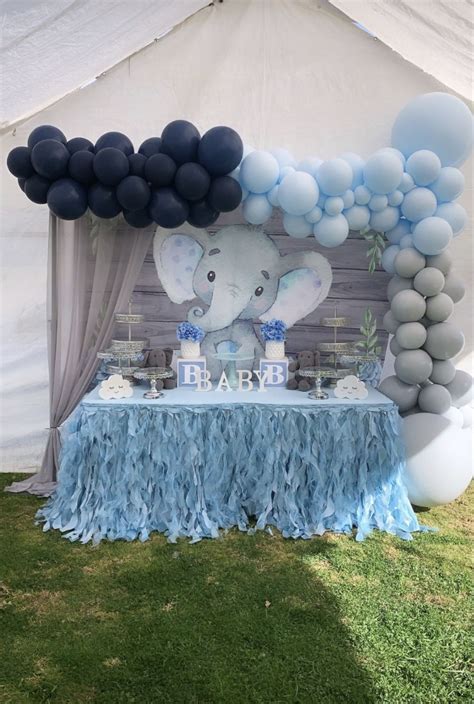 Baby shower baby elephant theme | Boy baby shower centerpieces, Peanut ...