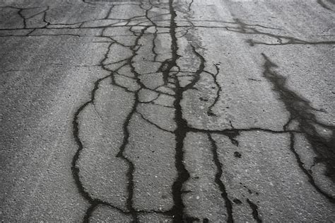 Premium Photo | Asphalt in cracks texture / abstract background cracks ...