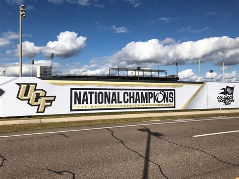 UCF adds National Champions banner to football practice field : r/CFB