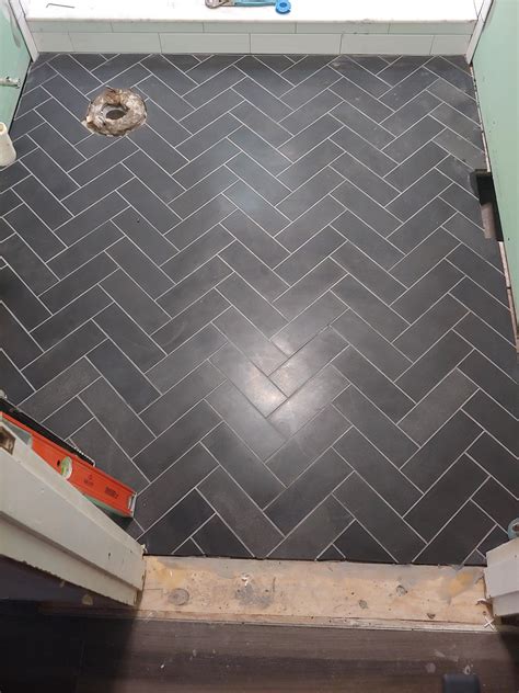 A herringbone tile floor I set by hand for a bathroom : InteriorDesign