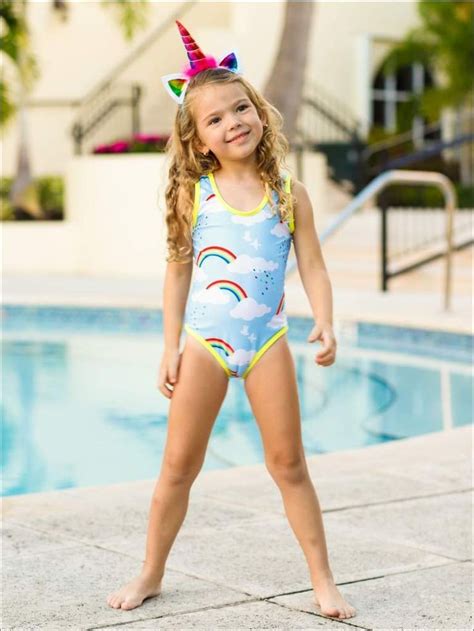 Your little beach sweetie can splash the day away in style with this bright and trend-right ...