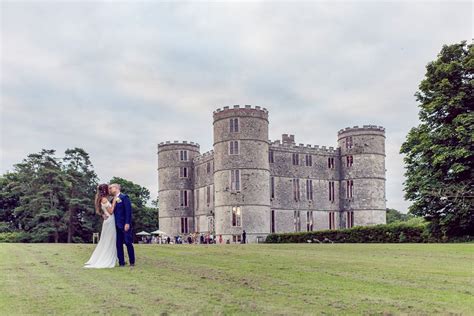 Lulworth Castle Wedding beautiful bride and groom relaxed portraitsby natural wedding ...