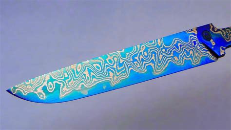 Metalsmith Turns Steel Mesh Into a Beautiful Blue Damascus Blade