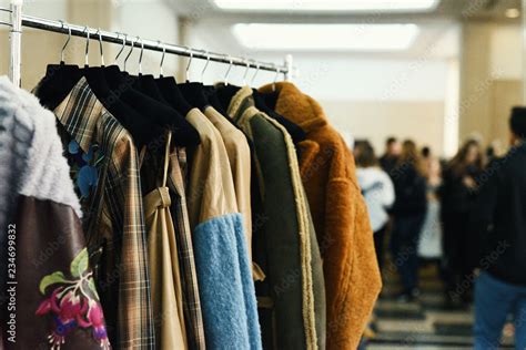 Colorful clothes on hangers Stock Photo | Adobe Stock