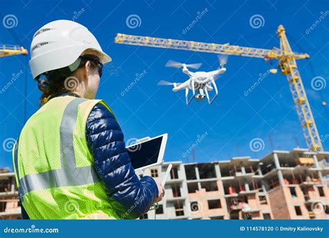 Drone Inspection. Operator Inspecting Construction Building Site Flying ...