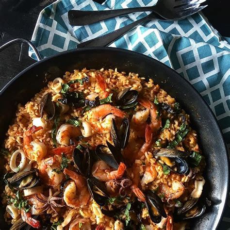 Seafood Paella With Saffron Rice And Red Mustard Greens Recipe | The ...