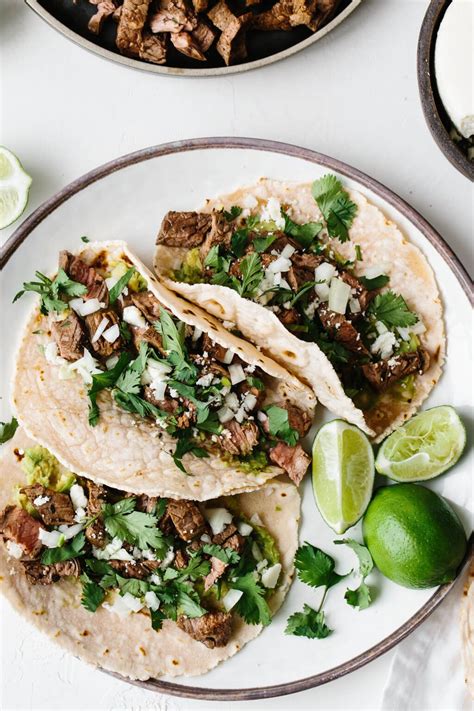 These delicious carne asada tacos are made with grilled skirt steak, avocado, cotija cheese ...