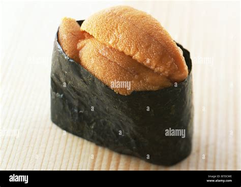 Sea urchin sushi Stock Photo - Alamy