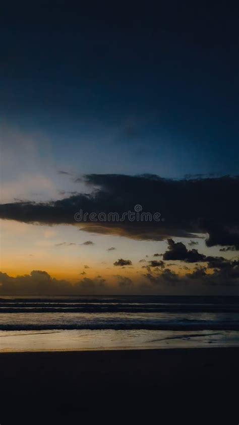 Sunset in Nusa Dua Beach stock photo. Image of dawn - 264139652