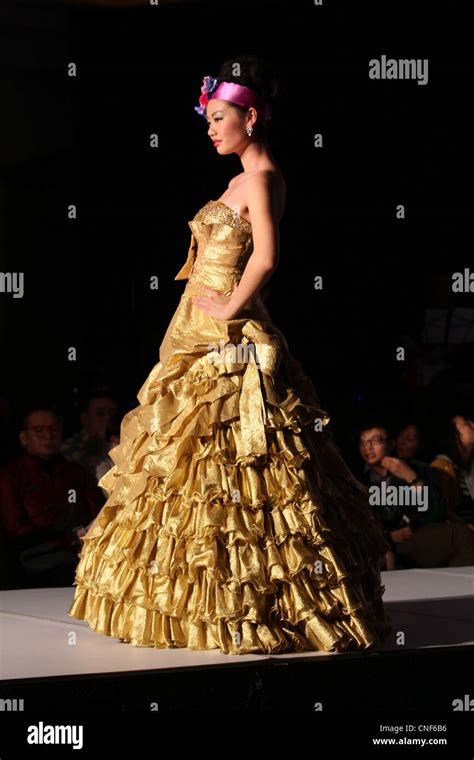 golden color dress Stock Photo - Alamy