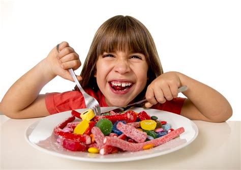 Child Eating Candy Like Crazy In Sugar Abuse And Unhealthy Sweet ...