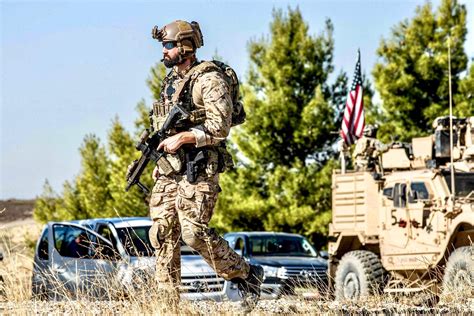 Crye Multicam Arid on the frontline. US Special Forces member walks ...