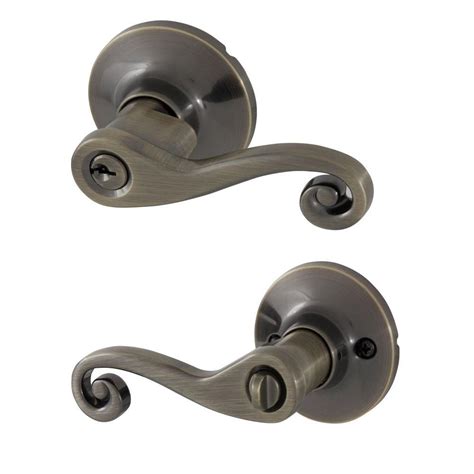 Honeywell Scroll Antique Brass Keyed Entry Door Lever-8108101 - The Home Depot