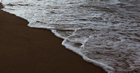 Sea Foam on by the Beach · Free Stock Photo