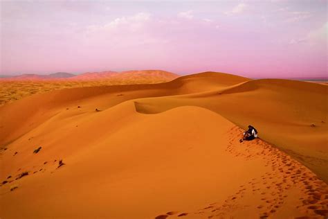two, people sit, sandy, desert, Two people, sit in, Morocco, Africa ...