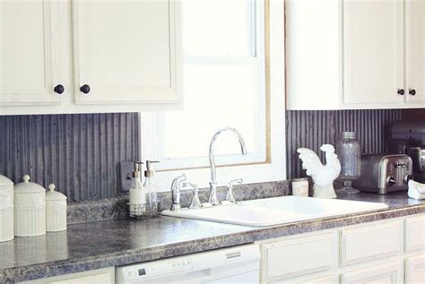 White Kitchen Cabinets With Tin Backsplash - PoppyBevan