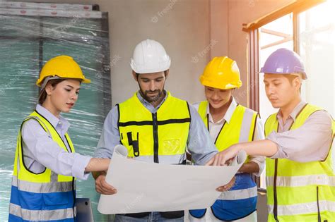 Premium Photo | Group of construction worker team working together ...