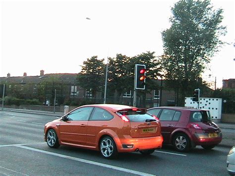Orange car orange light, red car red light | missfitzphotos | Flickr