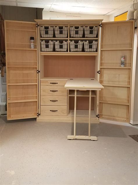 Crafting cabinet with fold out work table. | Sewing room design, Craft storage cabinets, Craft ...