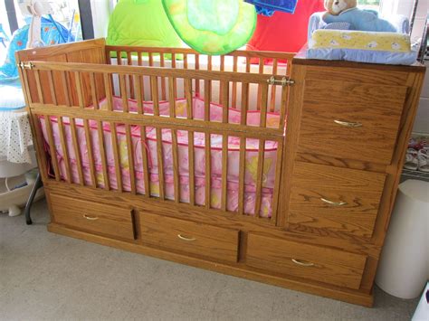 Solid Oak crib with five drawers for storage. #baby #nursery | Cribs, Solid oak, Storage