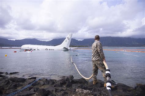 Navy airplane that crashed nine days ago still sits in Hawaii bay