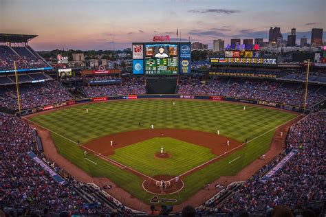 Players And Fans On Baseball Stadium Image Free Photo