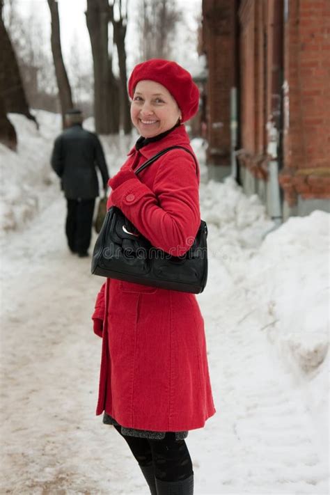 Mature woman on street stock image. Image of overcoat - 18864789