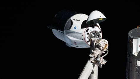 NASA, SpaceX Simulate Astronauts Docking to Station on Crew Dragon ...