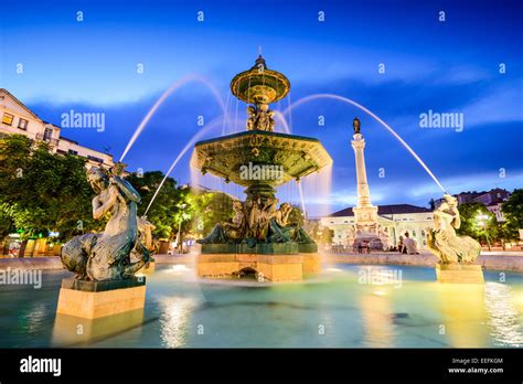 Rossio Square fountain in Lisbon, Portugal Stock Photo - Alamy